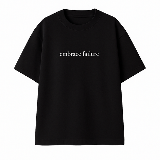 Remera Negra: EMBRACE FAILURE